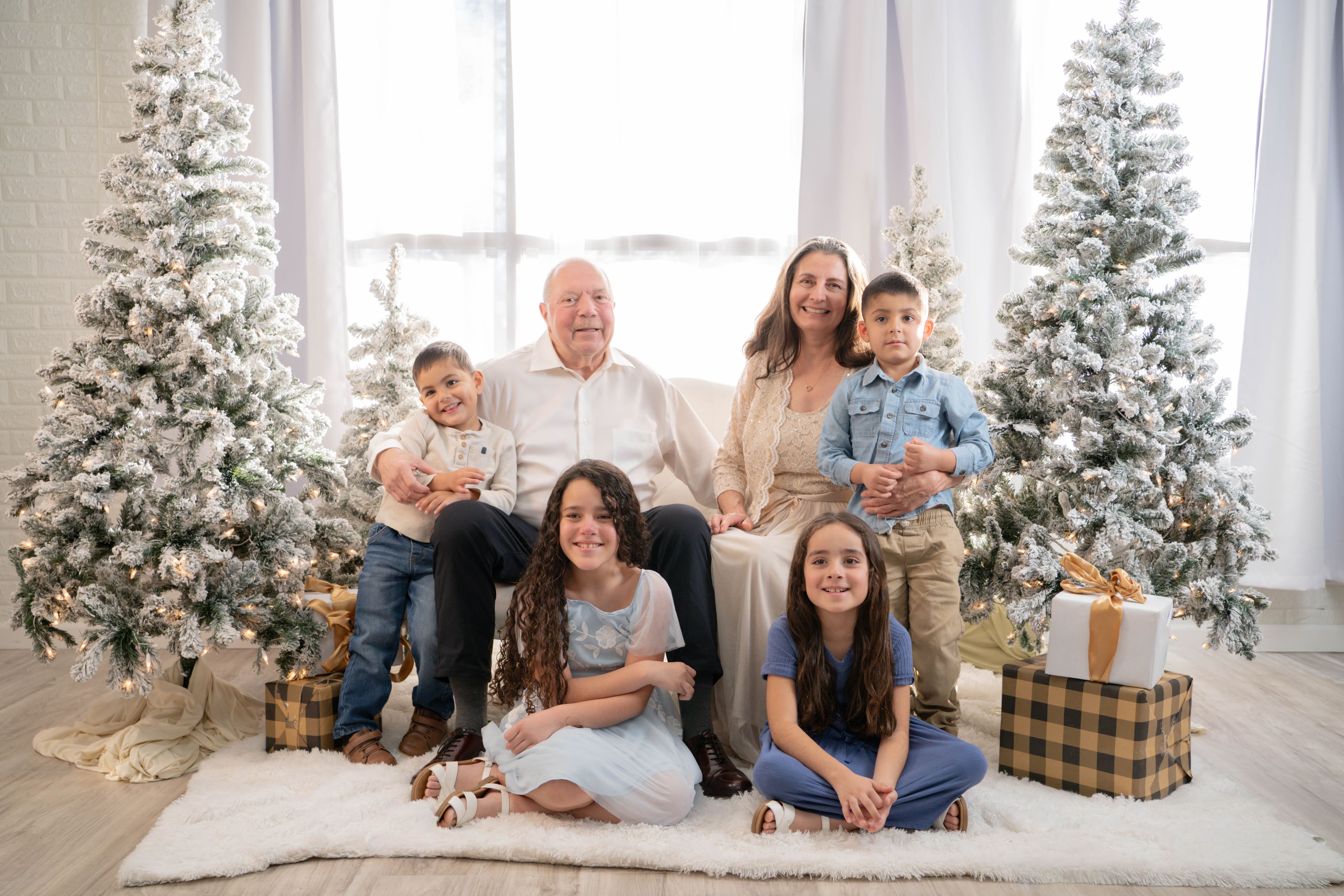 Child looking toward the camera during a warm family portrait session in Vacaville.