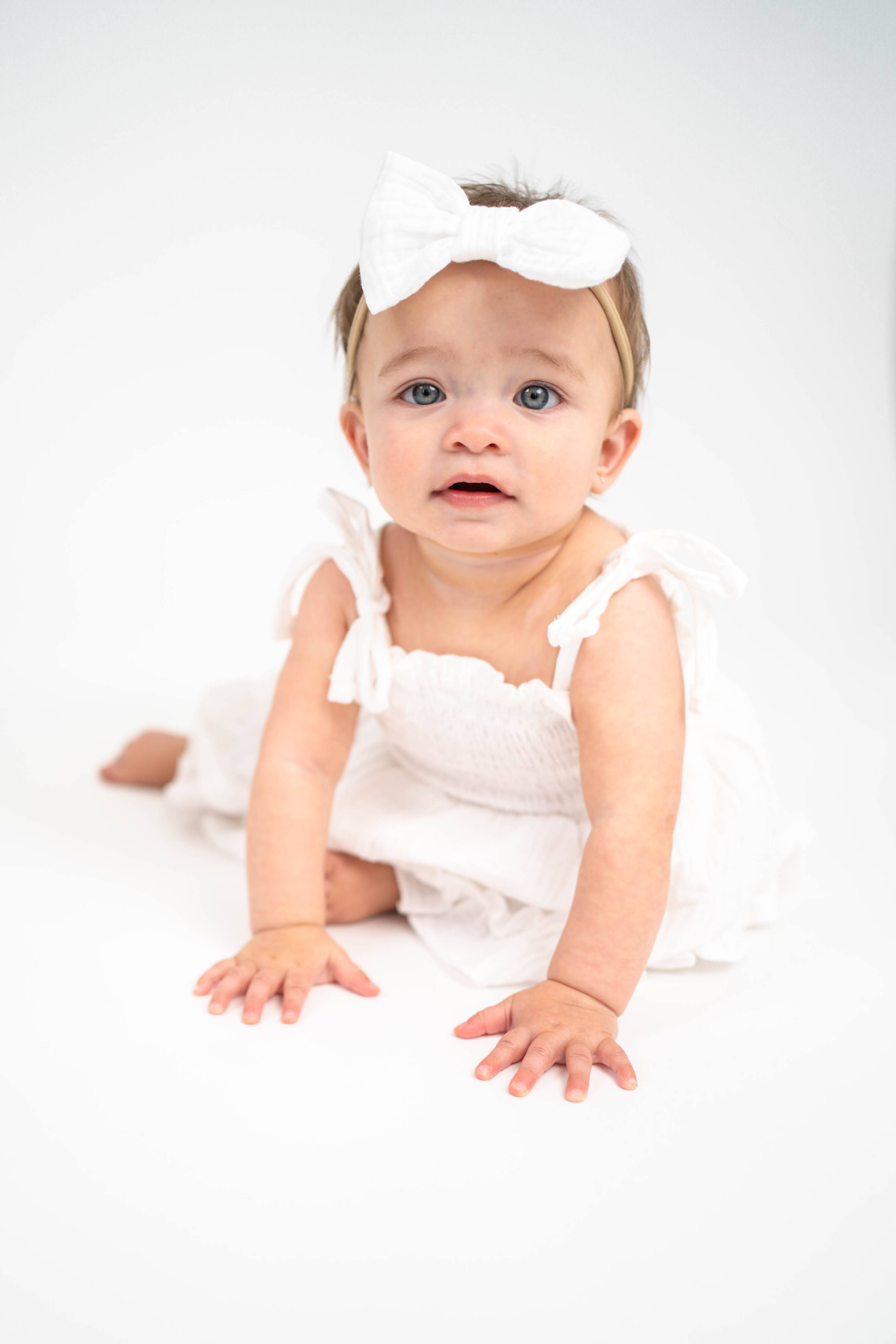 Parent and little one sharing a candid moment during a Solano County family session.