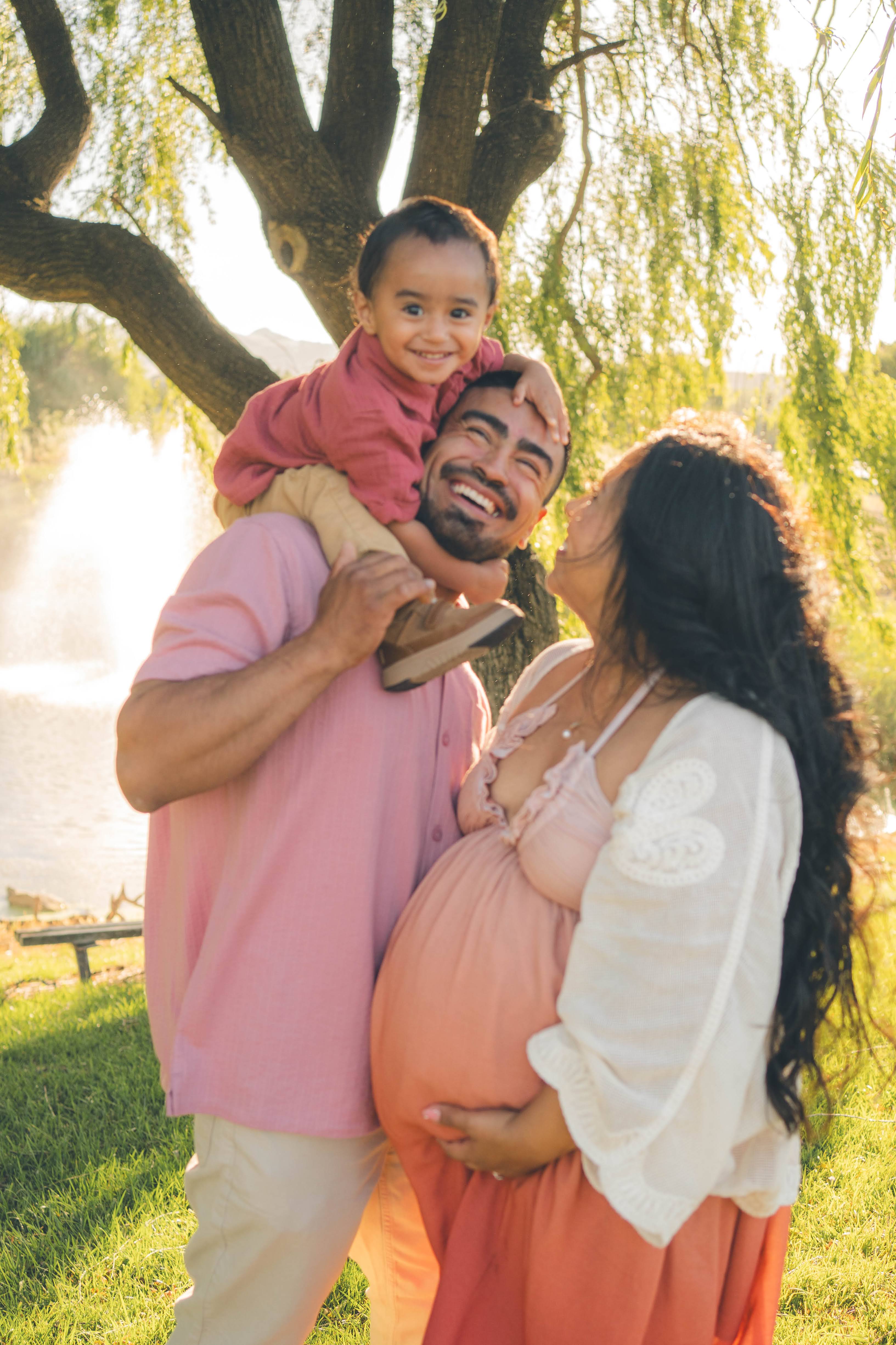 Maternity portrait with warm tones and natural movement during a Vacaville photo session.