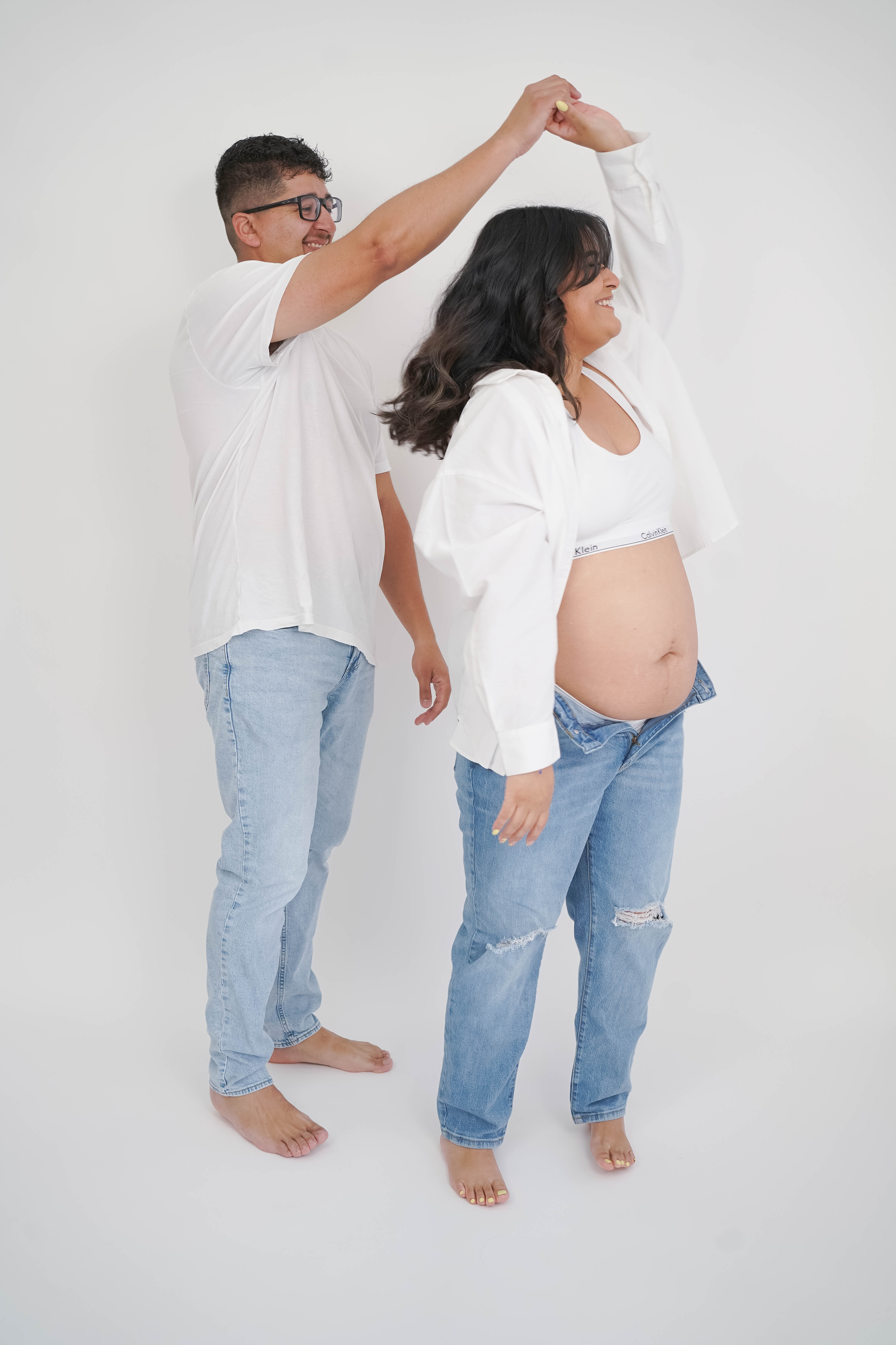 Maternity portrait with hands resting on baby bump during a Solano County session.