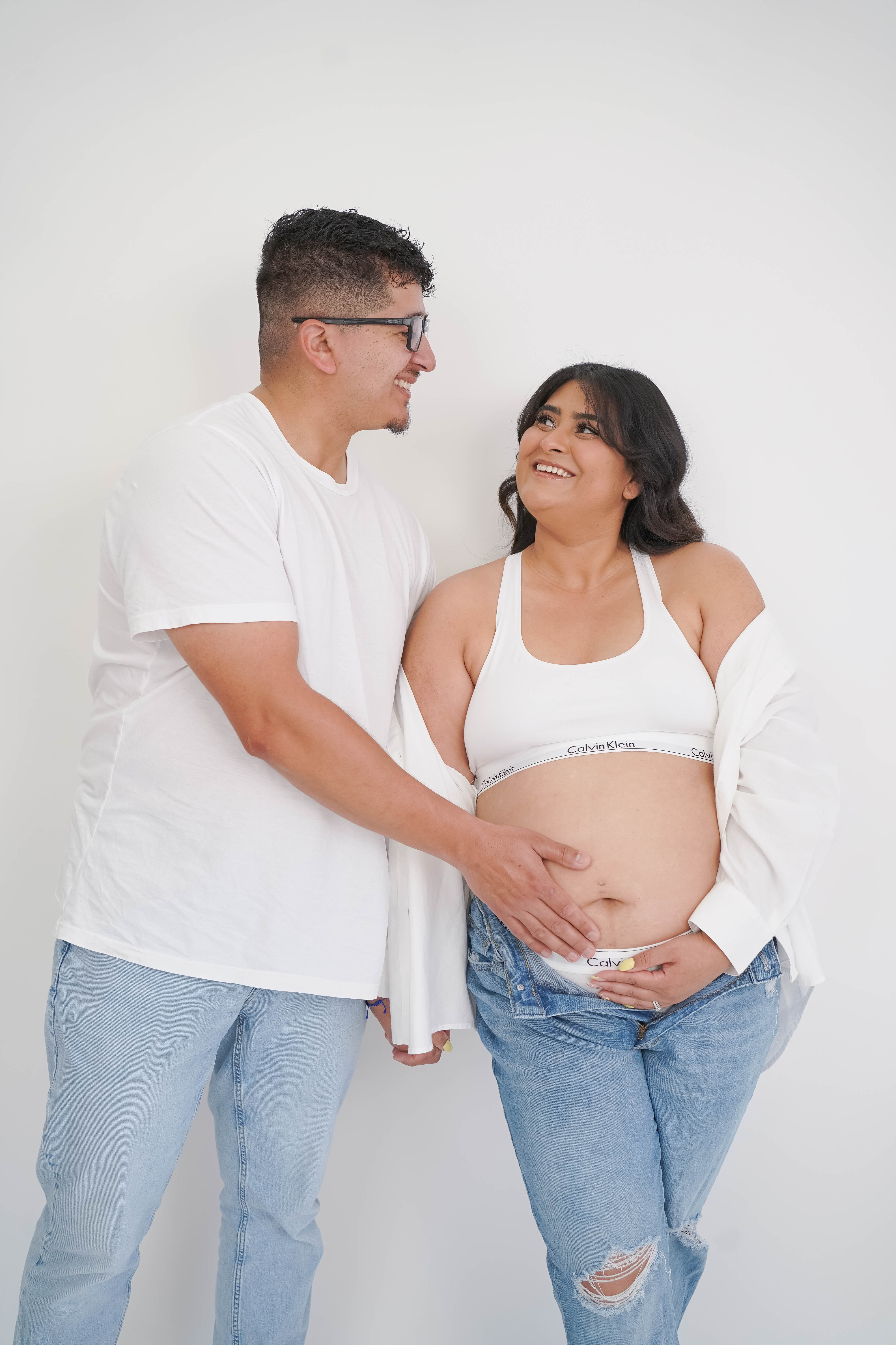 Outdoor maternity photo with warm light and simple posing during a Vacaville session.